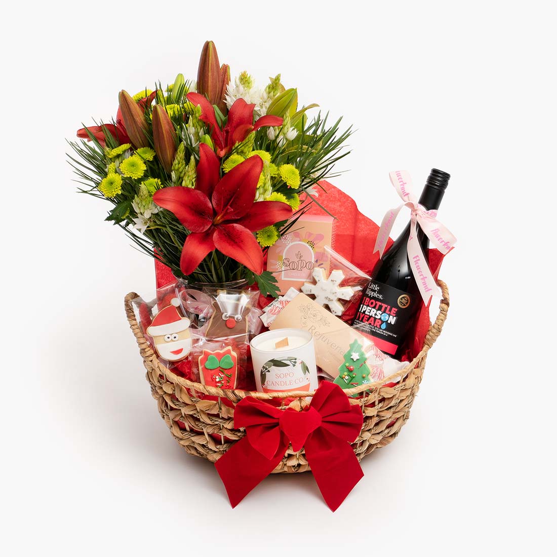 Red Christmas hamper with wine flowers and a candle from a Geelong florist